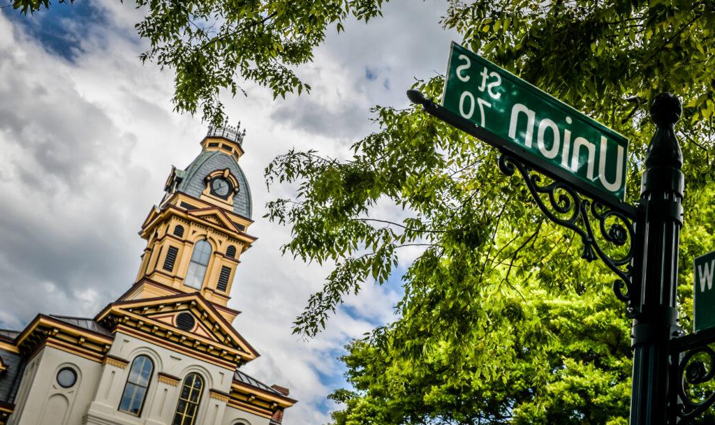 historic courthouse building and street sign